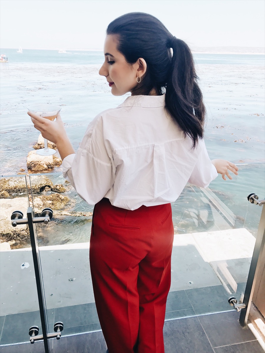 fashion blogger, red, red lips, red trousers, Monterey, CA, summer fashion, lookbook, outfit of the day, gold hoop earrings, oceanside, Schoooner's Monterey, blogger, ootd, lotd, fashion advice, button down top, Zara, Mango, Gucci belt